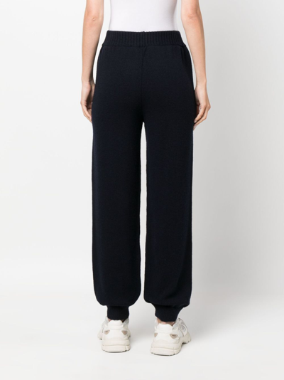 Shop Msgm Logo-embroidered Knitted Trousers In Blue