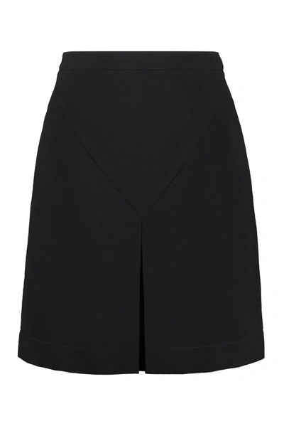 Shop Burberry Button Detailed Front-slit Mini Skirt In Black