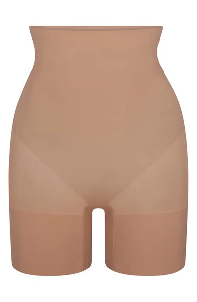 Shop Skims Everyday Sculpt Mid Thigh Shorts In Sienna