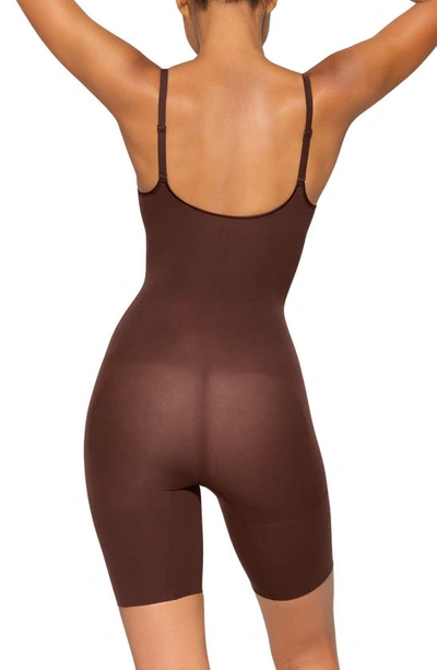 Shop Skims Everyday Sculpt Mid Thigh Bodysuit In Cocoa