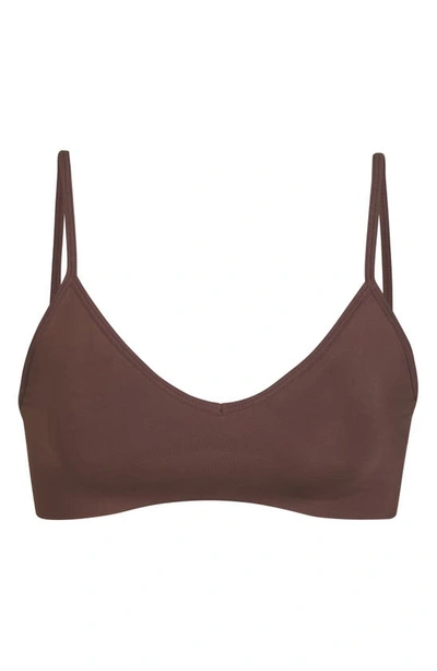 Shop Skims Soft Smoothing Seamless Bralette In Cocoa
