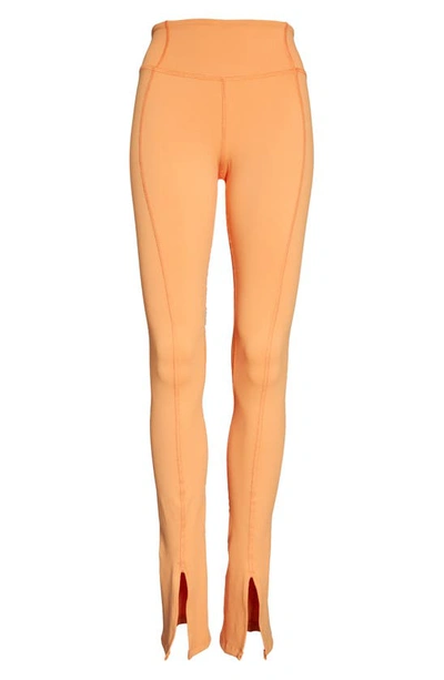 Shop Solely Fit Long Split Hem Leggings In Apricot