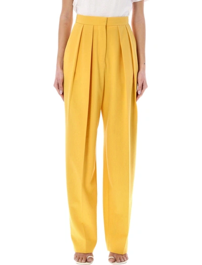 Shop Stella Mccartney Pleat Front Straight Leg Trousers In Sunflower Yellow
