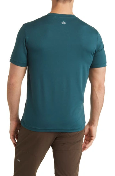 Shop Alo Yoga Conquer Reform Performance T-shirt In Midnight Green
