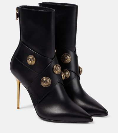 Balmain Black Ankle Boots Embellished With Gold Embossed Buttons In Black