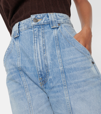 Shop Khaite Jackie Low-rise Wide-leg Jeans In Blue