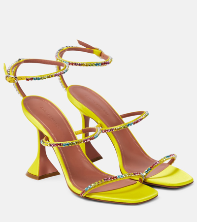 Shop Amina Muaddi Gilda 95 Embellished Pvc Sandals In Yellow