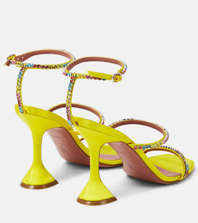 Shop Amina Muaddi Gilda 95 Embellished Pvc Sandals In Yellow