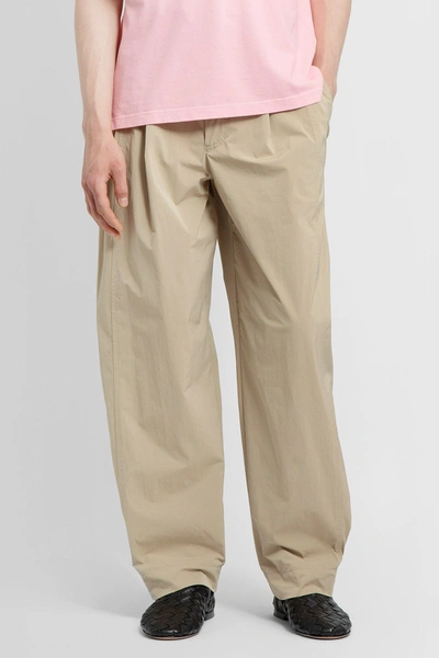 Shop Bottega Veneta Man Beige Trousers