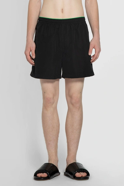 Shop Bottega Veneta Man Black Swimwear