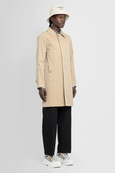 Shop Burberry Man Beige Coats