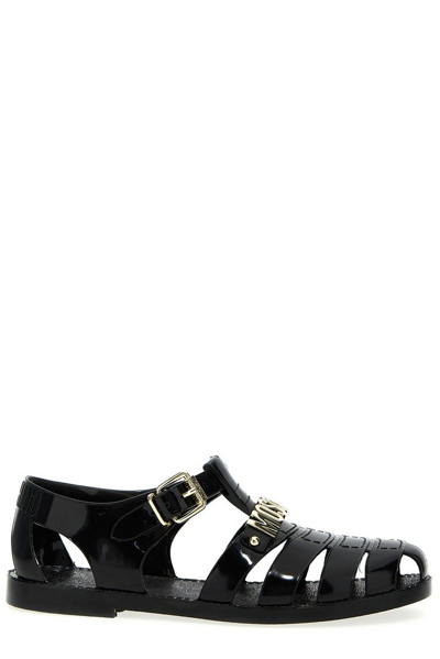 Shop Moschino Logo Lettering Sandals In Black