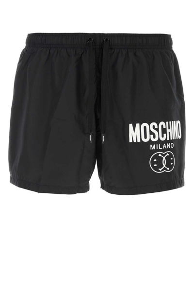 Shop Moschino Logo Printed Drawstring Swim Shorts In Black