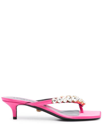 Shop Versace 55mm Crystal-embellished Thong Mules In 粉色