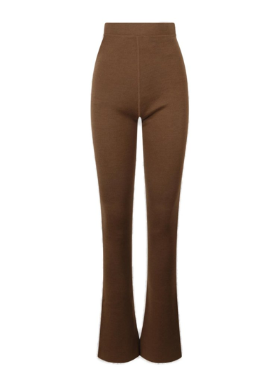 Shop Saint Laurent High Waist Flared Trousers In Brown