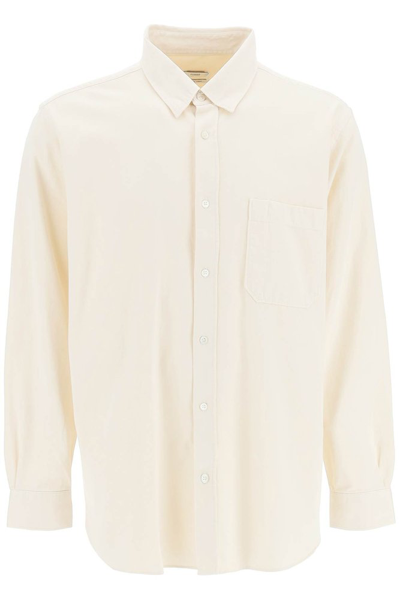 Shop Closed Curved Hem Buttoned Shirt In White