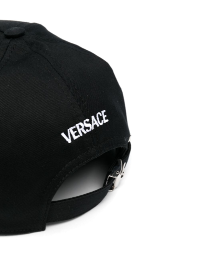 Shop Versace Medusa Studded Cap In Schwarz