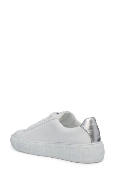 Shop Versace La Greca Logo Low Top Sneaker In White Silver