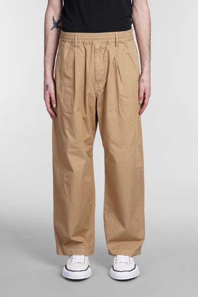 Shop Undercover Pants In Beige Cotton
