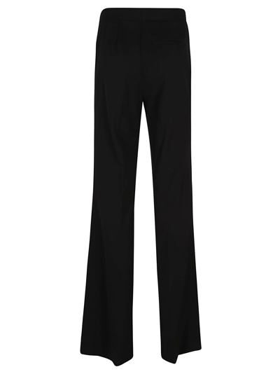 Shop Stella Mccartney Iconic Flared Trousers In Black