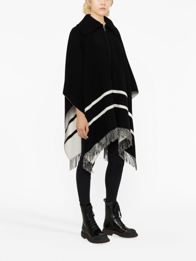 Shop Moncler Fringe-trim Striped Cape In Black