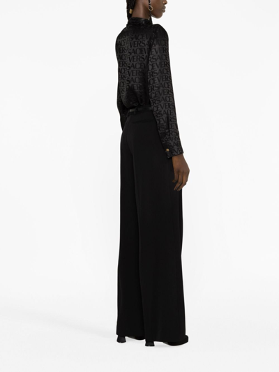 Versace Allover Logo Patterned Satin Shirt In Black