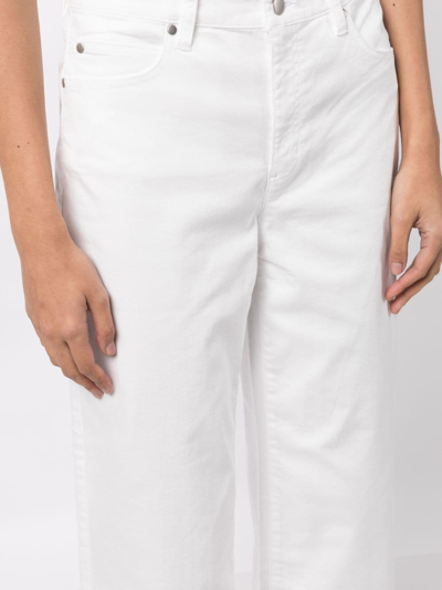 Shop Eileen Fisher Frayed Mid-rise Cropped Jeans In White