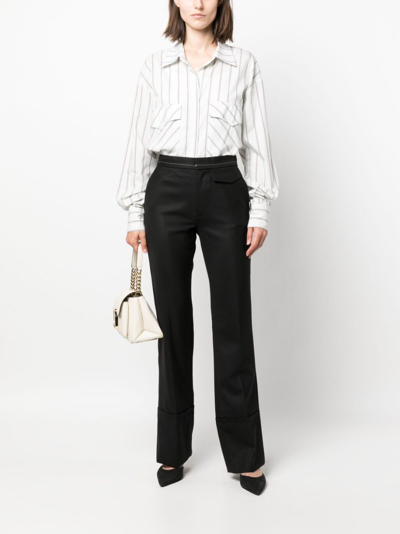 Shop Victoria Beckham Contrast-stitching Flared Trousers In Black