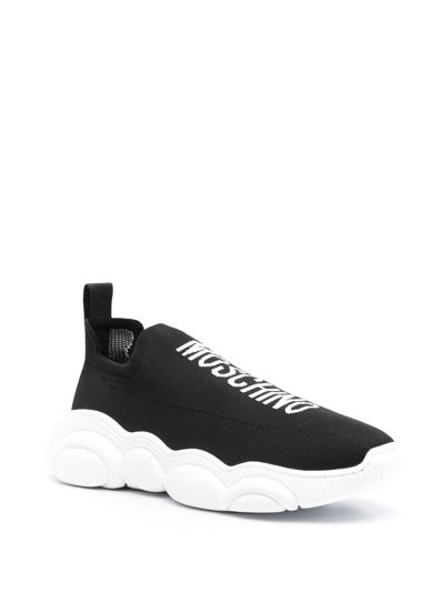 Shop Moschino Logo-knit Slip-on Sneakers In Black