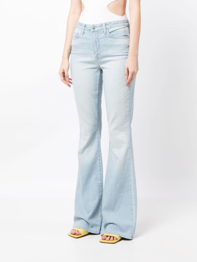 Shop L Agence Light-wash Flared Jeans In Blue