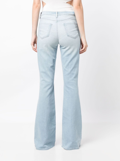 Shop L Agence Light-wash Flared Jeans In Blue