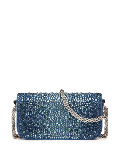 Shop Valentino Small Locò Embellished Denim Shoulder Bag In Blue
