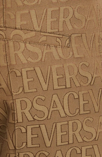 Shop Versace Allover Logo Jacquard Techno Canvas Cargo Joggers In Brown Beige