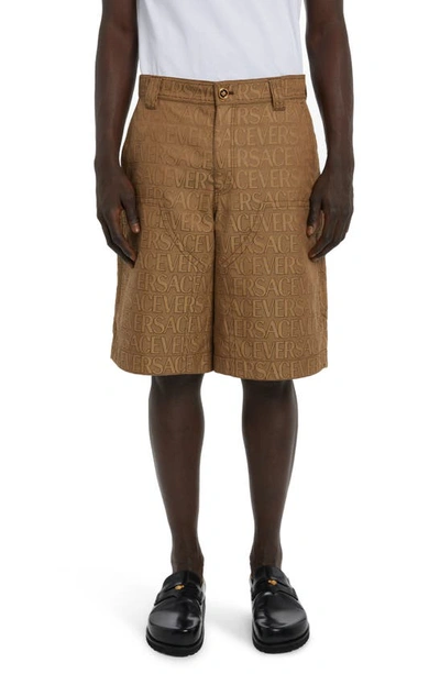 Shop Versace Allover Logo Jacquard Techno Canvas Shorts In Brown Beige