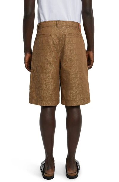 Shop Versace Allover Logo Jacquard Techno Canvas Shorts In Brown Beige