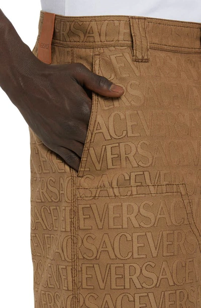 Versace Knee-length Shorts In All-over Pattern In Brown Beige