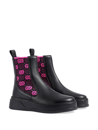 Shop Gucci Gg Motif Leather Boots In Black