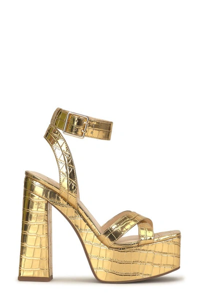 Shop Jessica Simpson Beasley Ankle Strap Platform Sandal In Metallic Gold