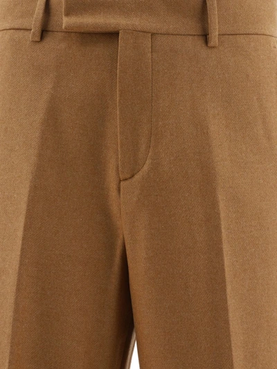 Shop Amiri Baggy Trousers In Brown