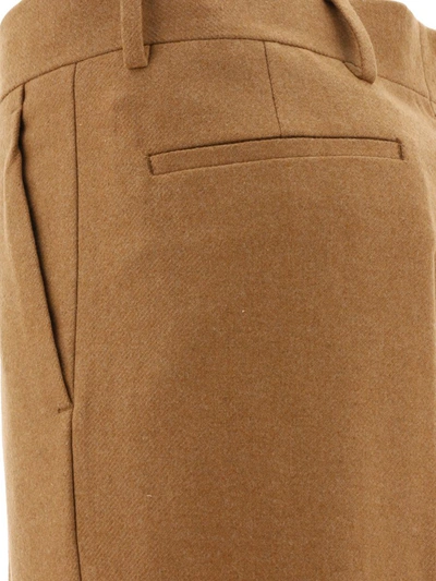 Shop Amiri Baggy Trousers In Brown
