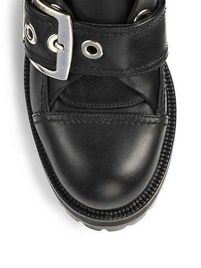 Shop Alexander Mcqueen Biker Leather Ankle Boots In Black