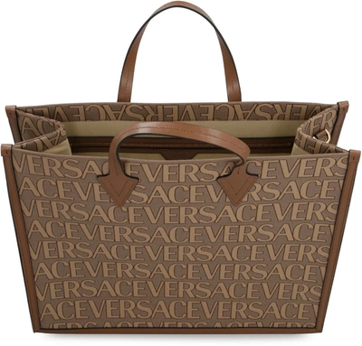 Shop Versace Canvas And Leather Shopping Bag In Beige