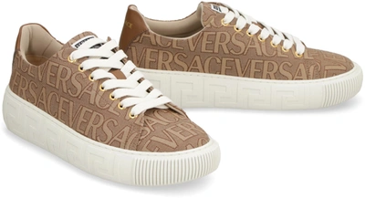 Shop Versace Greca Low-top Sneakers In Brown