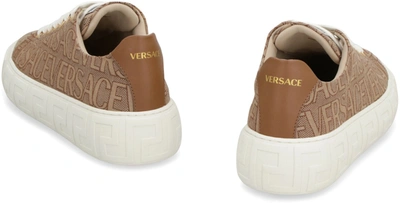 Shop Versace Greca Low-top Sneakers In Brown