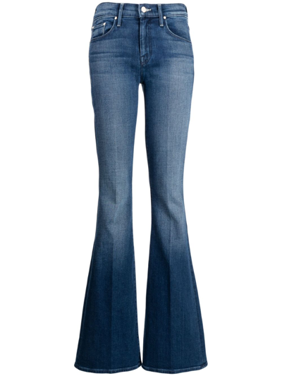 Shop Mother Light-wash Bootcut Jeans In Blue