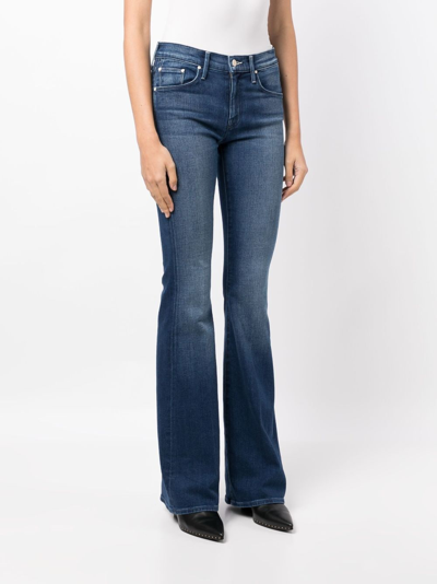 Shop Mother Light-wash Bootcut Jeans In Blue