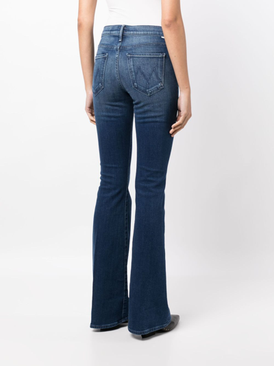 Shop Mother Light-wash Bootcut Jeans In Blue