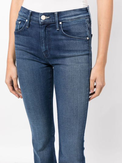 Shop Mother Light-wash Bootcut Jeans In Blue
