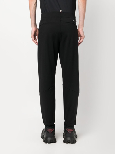 Shop Moncler Slim-cut Stretch Trousers In Black