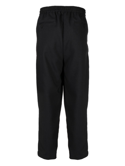 Shop Yoshiokubo Pleated Detail Drawstring Trousers In Black